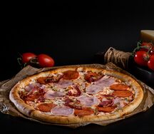 Фирменная пицца Мясная