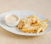 Картофель фри с пармезаном и трюфелем
