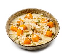 Каша пшенная с тыквой, кедровыми орешками и тыквенными семечками