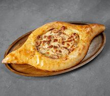 С курицей и соусом Чкмерули