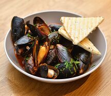 Мидии в томатном соусе