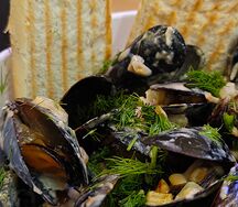 Мидии в сливочном соусе с пармезаном