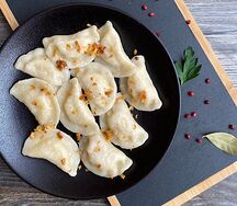 Вареники с капустой тушеной
