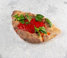 Кальцоне с ветчиной и грибами
