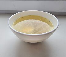 Куриный бульон с яйцом и курицей