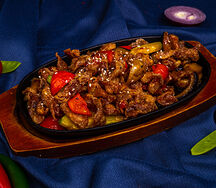 Горячая сковородка с курицей