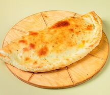 Пицца кальцоне