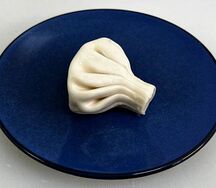 Вареные хинкали с картофелем и грибами