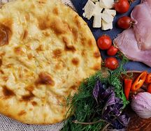 Осетинский пирог Курица сыр помидоры