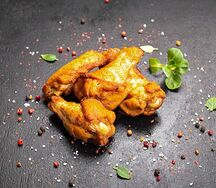 Куриные крылышки острые в панировке