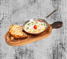 Мясо рапана в сливочном соусе