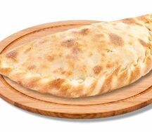 Кальцоне с ветчиной и сыром 