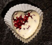 Гранат в белом шоколаде