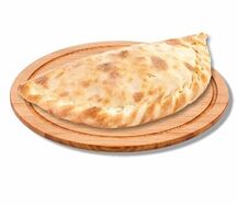 Кальцоне с ветчиной и сыром 