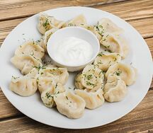 Пельмени отварные с курицей
