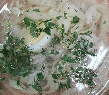 Куриный суп с лапшой и яйцом