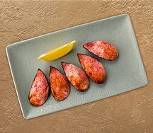 Мидии, запечённые под сырным соусом