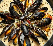 Мидии голубые в сливочно-чесночном соусе