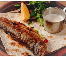 Форель запеченная в фольге с овощами