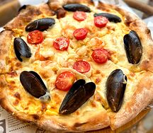 Пицца с морепродуктами