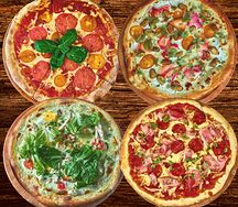 Комбо из четырех пицц на компанию