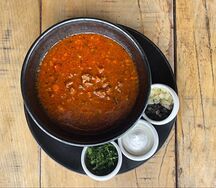 Солянка с колбасами собственного производства