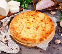 Осетинский пирог с курицей, сыром и грибами