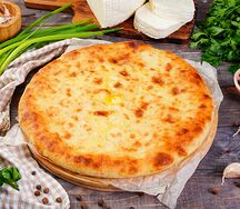 Осетинский пирог с сыром и зеленым луком