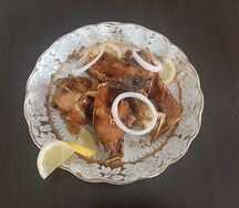 Рыба карп жареная