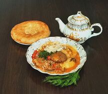 Бифштекс из говядины с гарниром по-узбекски