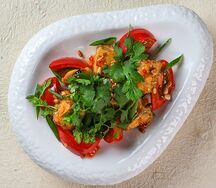 Теплый салат из баклажанов с томатами