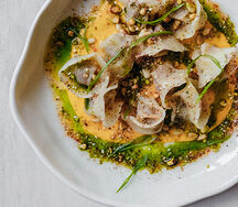 Арабские пельмени с кремом, кедровыми орехами и маслом из аджики