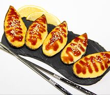 Мидии, запеченные под чесночным соусом