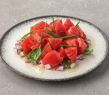 Томаты с ялтинским луком и гранатовой выжимкой