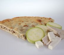 Осетинский пирог с индейкой, кабачками и сыром