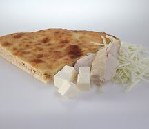 Осетинский пирог с курицей, капустой и сыром