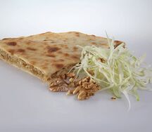 Осетинский пирог с капустой и грецким орехом
