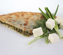 Осетинский пирог с сыром, зеленью и луком