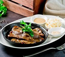 Язык говяжий томлёный