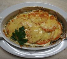 Язык, запеченный с овощами