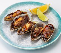 Мидии, запеченные в чесночном соусе
