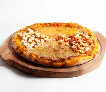 Пицца четыре сыра