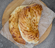 Половинка тандырной лепешки