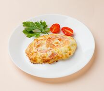 Отбивная из куриного филе с помидорами под сыром