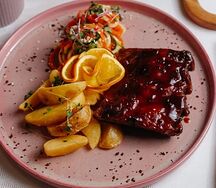 Свиные ребра, томленные с апельсином