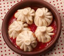 Хинкали в соусе чакапули