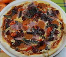 Пицца Мясная на толстом тесте