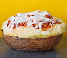 Запечённый картофель с курицей болоньезе под сыром