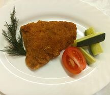 Рыба жаренная в сухарях