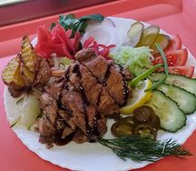 Шаверма Special на тарелке с рыбой